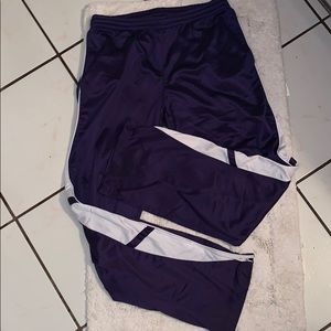 purple and white track pants